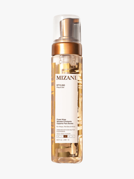 Mizani Styling Foam Hair Mousse in branded clear bottle with copper gold pump on light gray background